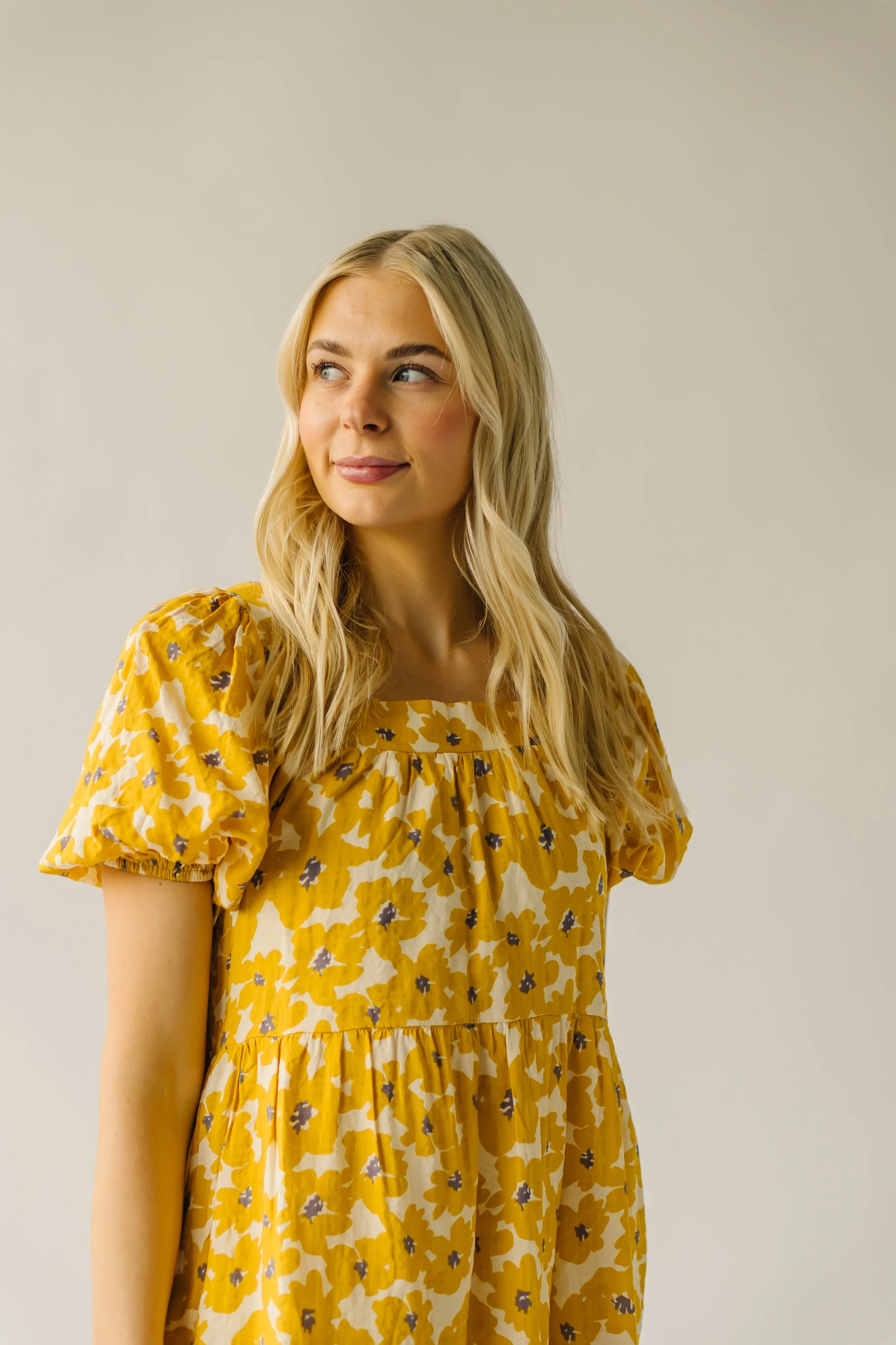 The Burwell Tiered Midi Dress in Mustard Floral